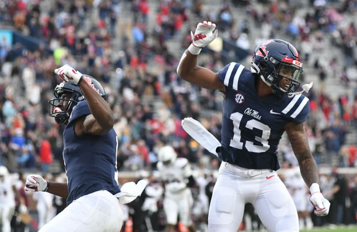 Mississippi wide receiver Braylon Sanders (13) and Mississippi wide receiver Jonathan Mingo (1) celebrate a touchdown against Mississippi State Bulldogs at Vaunt-Hemingway Stadium in Oxford, Miss. on Saturday, Nov. 28, 2020. (Bruce Newman)
